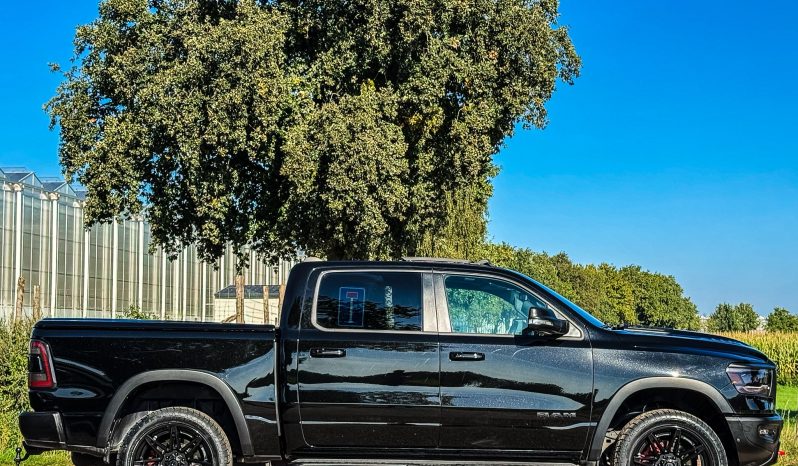 DODGE RAM 1500 5.7L HEMI 4X4 401PK V8 * REBEL * WIDE BODY * BOM VOL * BEEST * 22 INCH FUEL * 2023 * KM STAND 52.000 KM * CUSTOM STRIPING * PPF SMOKE VERLICHTING * HEAD-UP DISPLAY * DIGITALE BINNEN SPIEGEL * vol