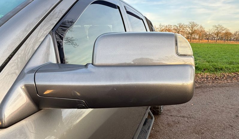 DODGE RAM 1500 5.7L V8 HEMI 4X4 401PK * SPORT * WIDE BODY * VERHOOGD * VERBREED * MORIMOTO KOPLAMPEN * CUSTOM UITLAATSYSTEEM * PPF SMOKE VERLICHTING * ROLBAR * LAGE BIJTELLING * LEDBAR * 22 INCH LICHTMETALEN SPORTVELGEN * ROLBAR * OFF ROAD BANDEN * vol