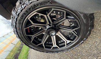 DODGE RAM 1500 5.7L V8 HEMI 4X4 401PK * SPORT * WIDE BODY * VERHOOGD * VERBREED * MORIMOTO KOPLAMPEN * CUSTOM UITLAATSYSTEEM * PPF SMOKE VERLICHTING * ROLBAR * LAGE BIJTELLING * LEDBAR * 22 INCH LICHTMETALEN SPORTVELGEN * ROLBAR * OFF ROAD BANDEN * vol