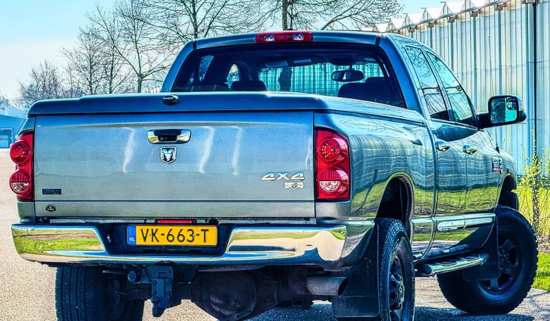 DODGE RAM 2500 6.7 L CUMMINS TURBO DIESEL* THE 1 MILLION ENGINE * ONVERWOESTBAAR STERK * SCHUIFKANTELDAK * VOL LEDER * TREKHAAK 3500 KG * AFSTAND START * FULL OPTION * KEURIG NETTE CONDITIE * SLECHTS 213.000 KM N.A.P * LEDBAR * VERHOOGD * VERBREED * EXTREEM LAGE BIJTELLING * LIEFHEBBER * UNIEK * vol