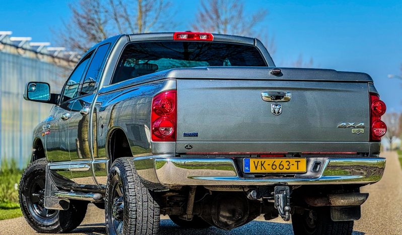 DODGE RAM 2500 6.7 L CUMMINS TURBO DIESEL* THE 1 MILLION ENGINE * ONVERWOESTBAAR STERK * SCHUIFKANTELDAK * VOL LEDER * TREKHAAK 3500 KG * AFSTAND START * FULL OPTION * KEURIG NETTE CONDITIE * SLECHTS 213.000 KM N.A.P * LEDBAR * VERHOOGD * VERBREED * EXTREEM LAGE BIJTELLING * LIEFHEBBER * UNIEK * vol