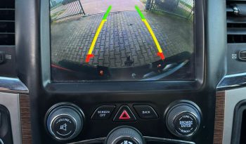 DODGE RAM 1500 5.7L V8 HEMI 4X4 401PK * LARAMIE * BLACK-OPPS * FULL OPTION * MAGNAFLOW UITLAATSYSTEEM * PPF SMOKE ROND OM * CUSTOM STRIPING * TOW HOOKS * AFSTAND START * LPG PRINS ONDERBOUW * APPLE CARPLAY * SCHUIFKANTELDAK * STOELVERKOELING * STOELVERWARMING * STUURVERWARMING * vol