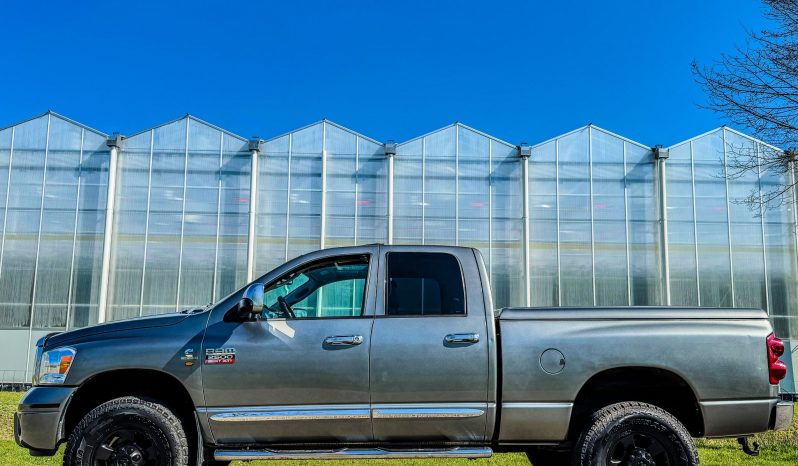 DODGE RAM 2500 6.7 L CUMMINS TURBO DIESEL* THE 1 MILLION ENGINE * ONVERWOESTBAAR STERK * SCHUIFKANTELDAK * VOL LEDER * TREKHAAK 3500 KG * AFSTAND START * FULL OPTION * KEURIG NETTE CONDITIE * SLECHTS 213.000 KM N.A.P * LEDBAR * VERHOOGD * VERBREED * EXTREEM LAGE BIJTELLING * LIEFHEBBER * UNIEK * vol