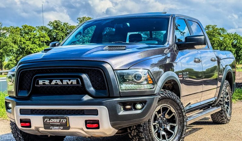 DODGE RAM 1500 5.7L HEMI 4X4 401PK V8 * REBEL * OFF – ROAD * RAMBOX * 2E EIGENAAR * NETTE CONDITIE * ZWARTE HEMEL * SCHUIFKANTELDAK * AFSTAND START * STOELVERWARMING * STUURVERWARMING * SIDE BARS * TOW HOOKS ROOD * 18 INCH OFF ROAD LICHTMETALEN SPORTVELGEN * vol