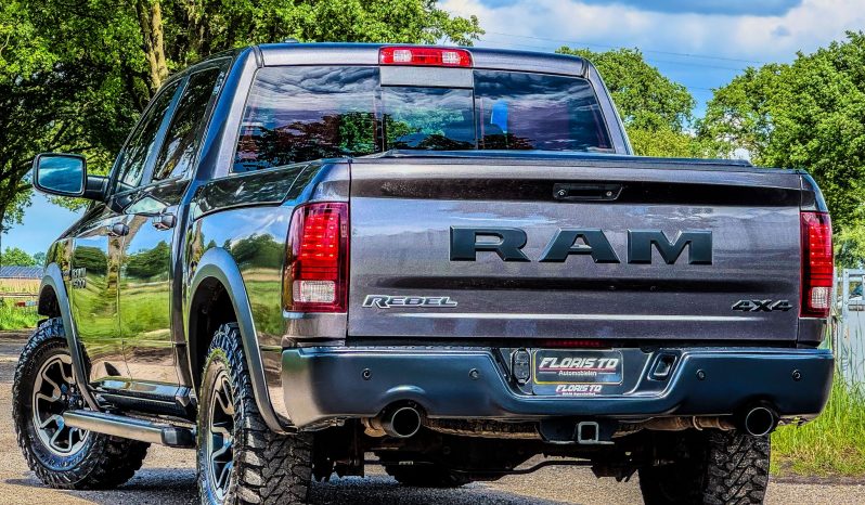 DODGE RAM 1500 5.7L HEMI 4X4 401PK V8 * REBEL * OFF – ROAD * RAMBOX * 2E EIGENAAR * NETTE CONDITIE * ZWARTE HEMEL * SCHUIFKANTELDAK * AFSTAND START * STOELVERWARMING * STUURVERWARMING * SIDE BARS * TOW HOOKS ROOD * 18 INCH OFF ROAD LICHTMETALEN SPORTVELGEN * vol