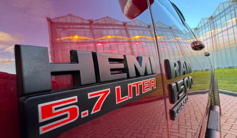 DODGE RAM 1500 5.7L HEMI V8 4X4 401PK * WARLOCK * REBEL * MORIMOTO KOPLAMPEN * GUNSTIGE CATALOGUS WAARDE * PRACHTIGE KLEUR * UNIEK * ZWARTE HEMEL * SCHUIFKANTELDAK * 22 INCH SPORTVELGEN * SUPER DIKKE PICK-UP * WEINIG KILOMETERS * 1E EIGENAAR * NIEUWSTAAT * vol